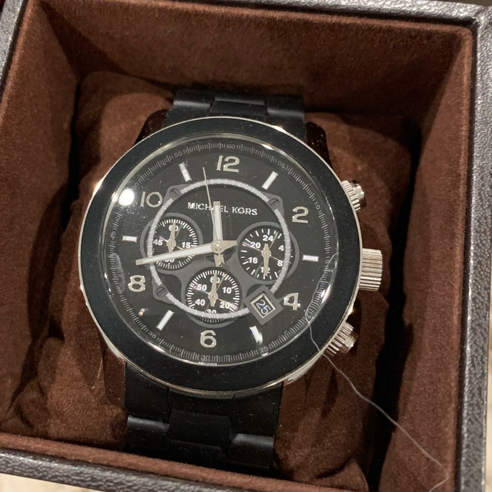 Men’s MK watch.